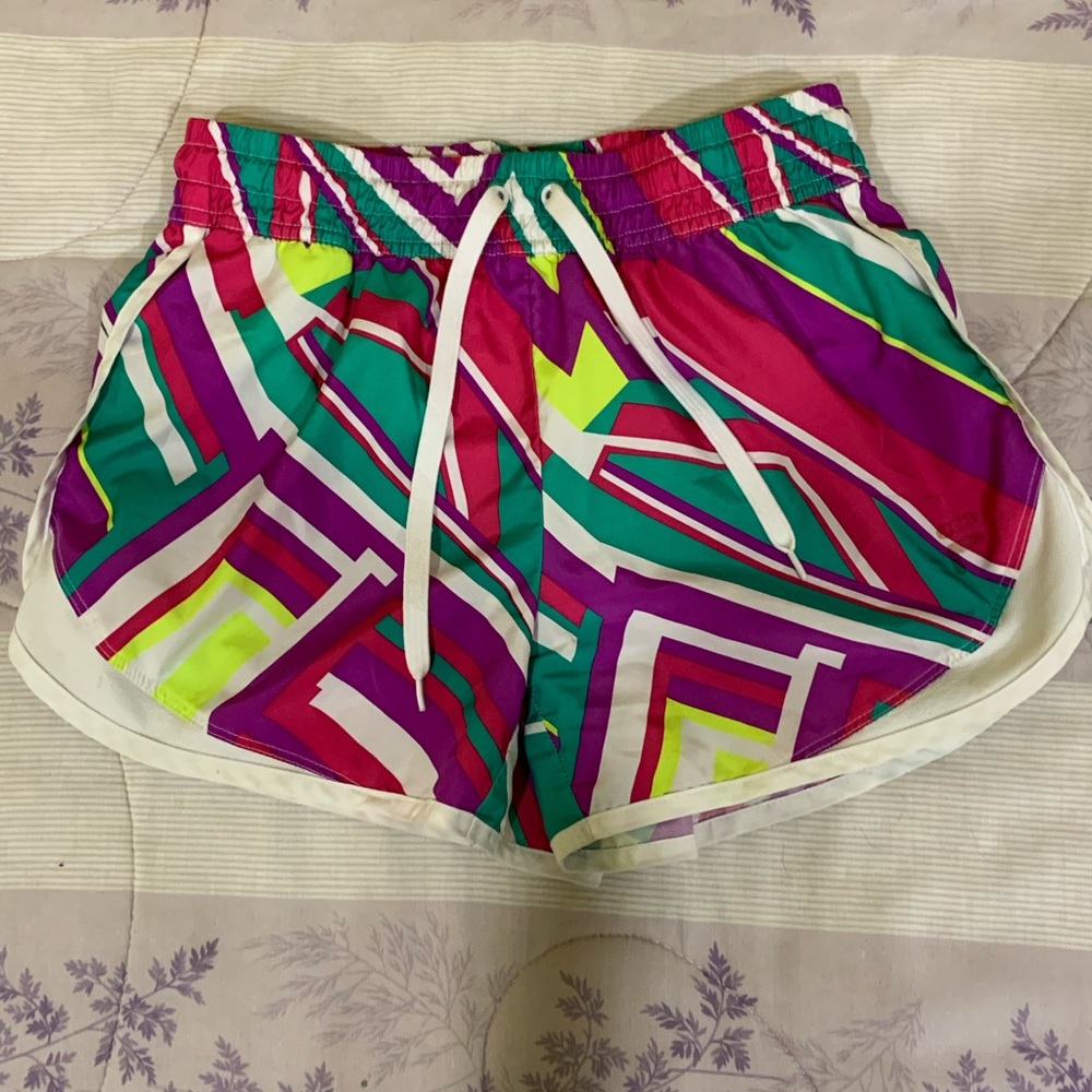 Bright, geometrically patterned athletic shorts